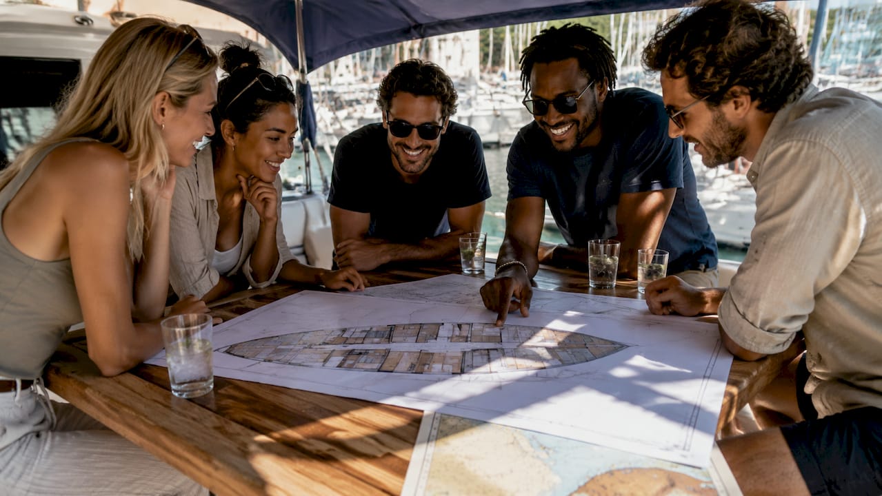 Group planning catamaran cabin allocation outdoors