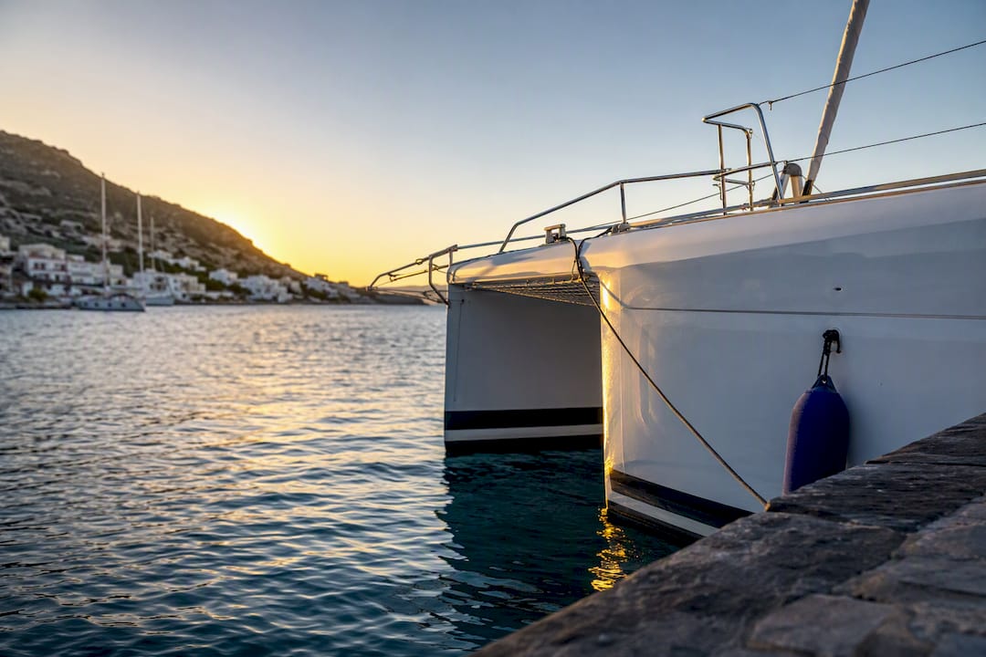 Catamaran bow in Greek charter harbor